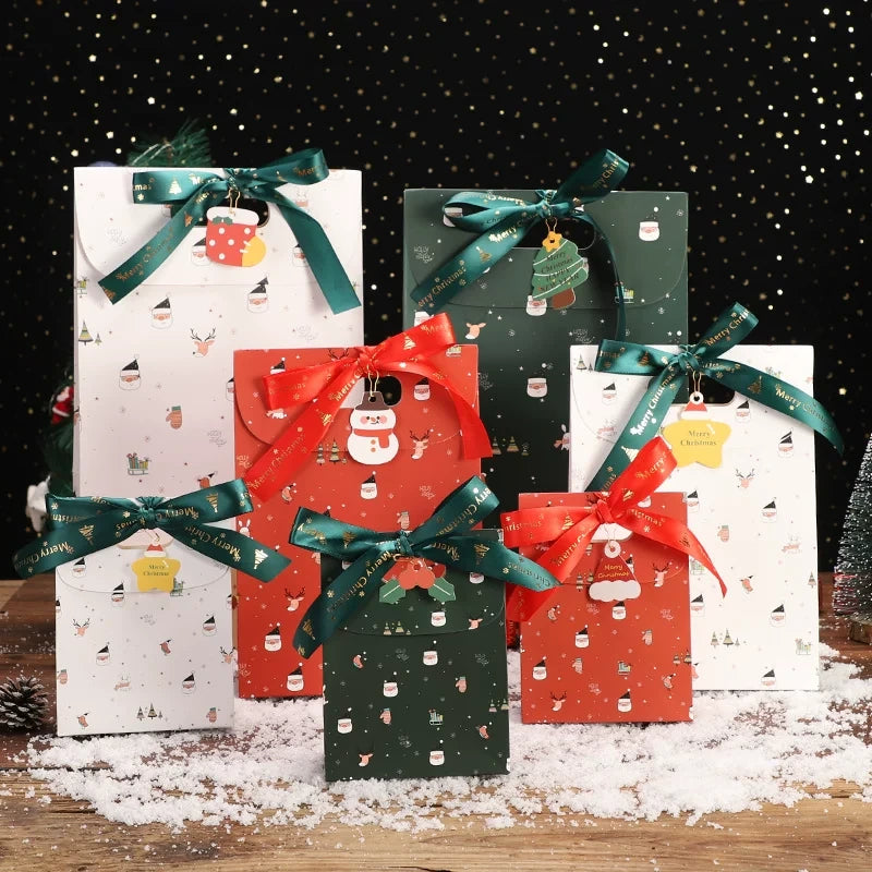 Assorted Christmas paper gift bags in three sizes