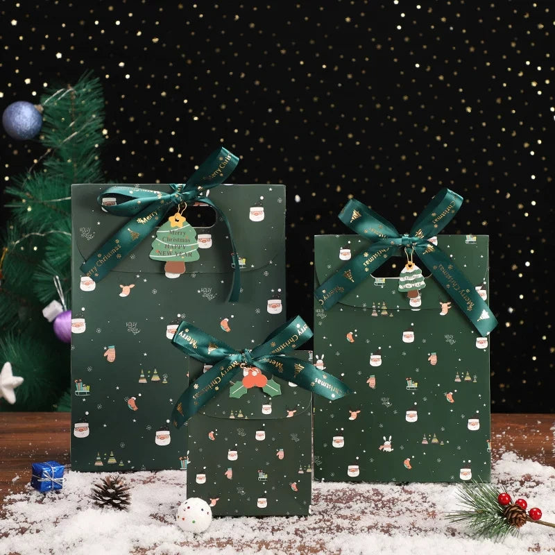 Dark green Christmas paper gift bags with ribbon handles