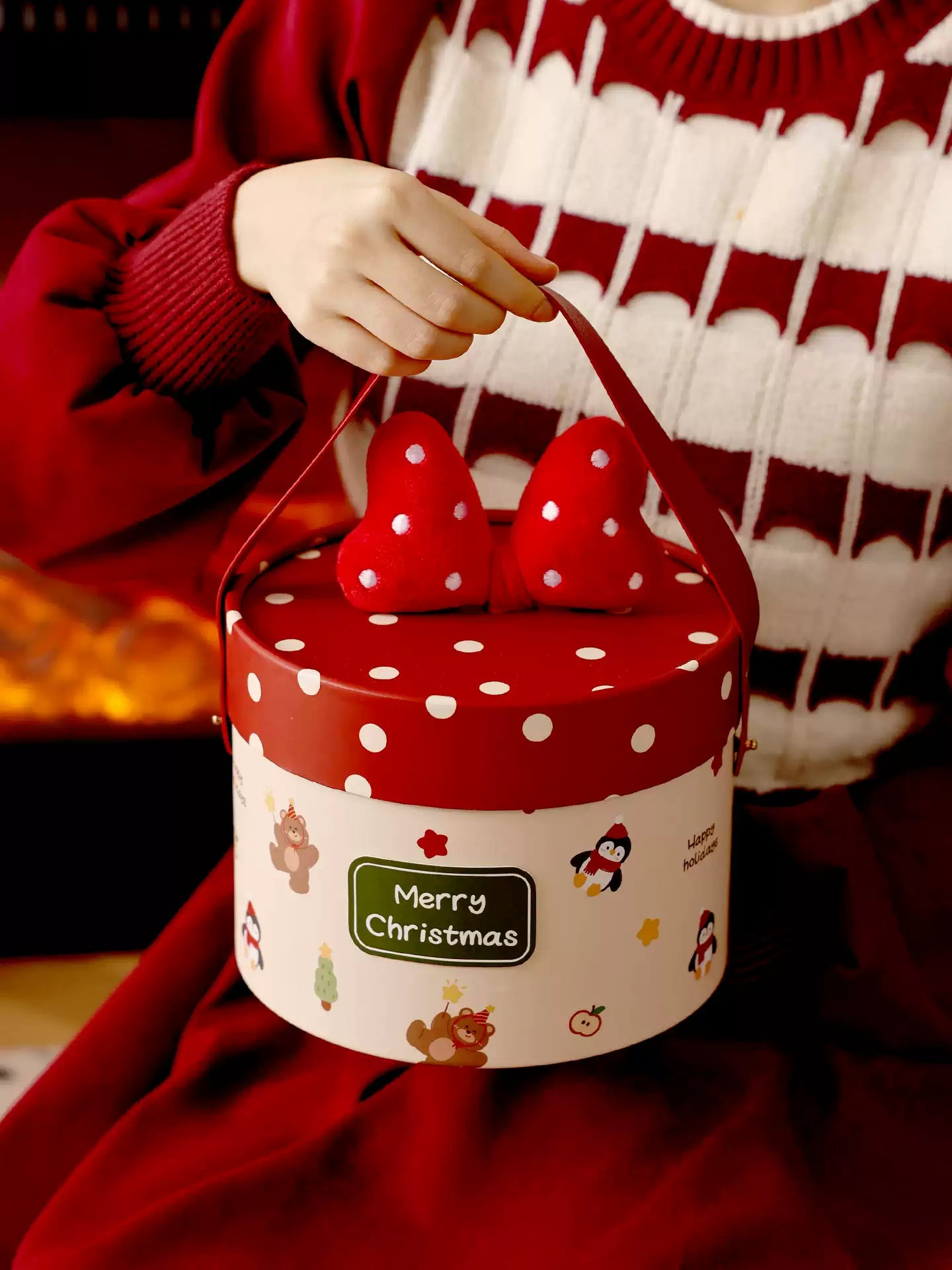Round Christmas gift hatbox with plush bow and carry handle