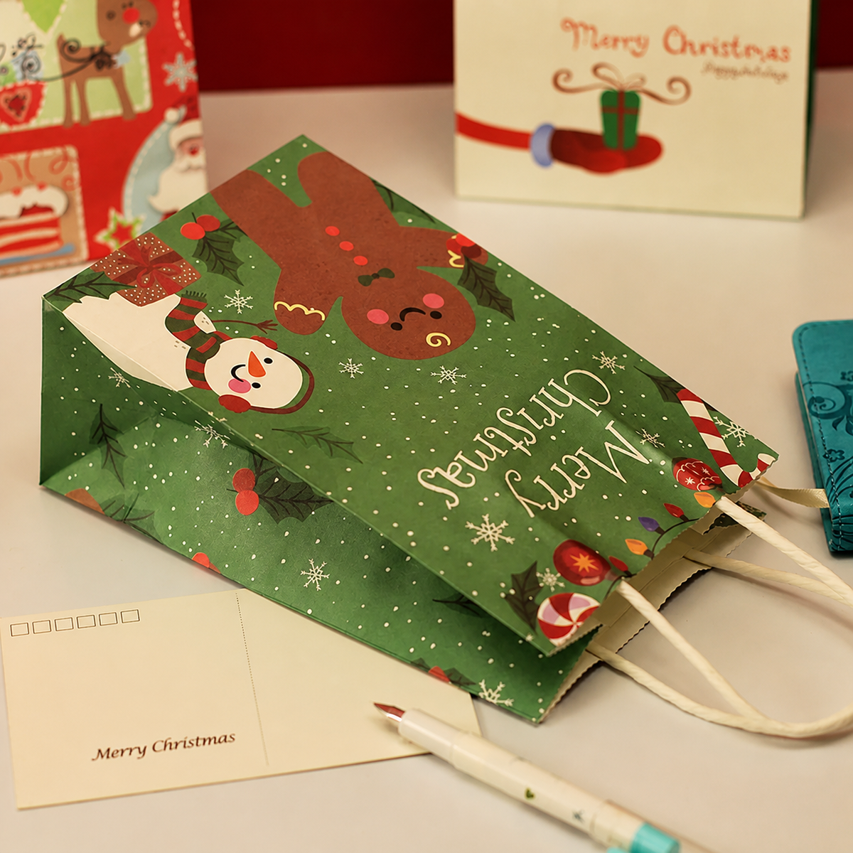 Design 14 green gingerbread snowman 150gsm kraft Christmas paper gift bag